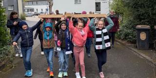 Kreuztragen mit Familien